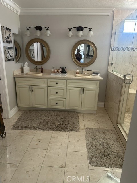 17289 Armintrout Drive Riverside, CA 92504 - Photo 17 of 30 a room with two mirror and clock on the wall