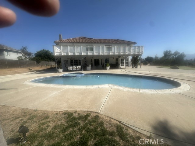 17289 Armintrout Drive Riverside, CA 92504 - Photo 18 of 30 a view of a house with swimming pool