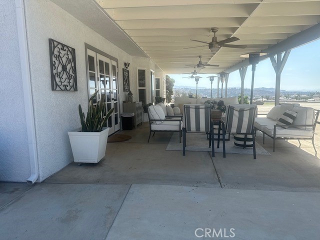 17289 Armintrout Drive Riverside, CA 92504 - Photo 8 of 30 a dining room with furniture and a potted plant