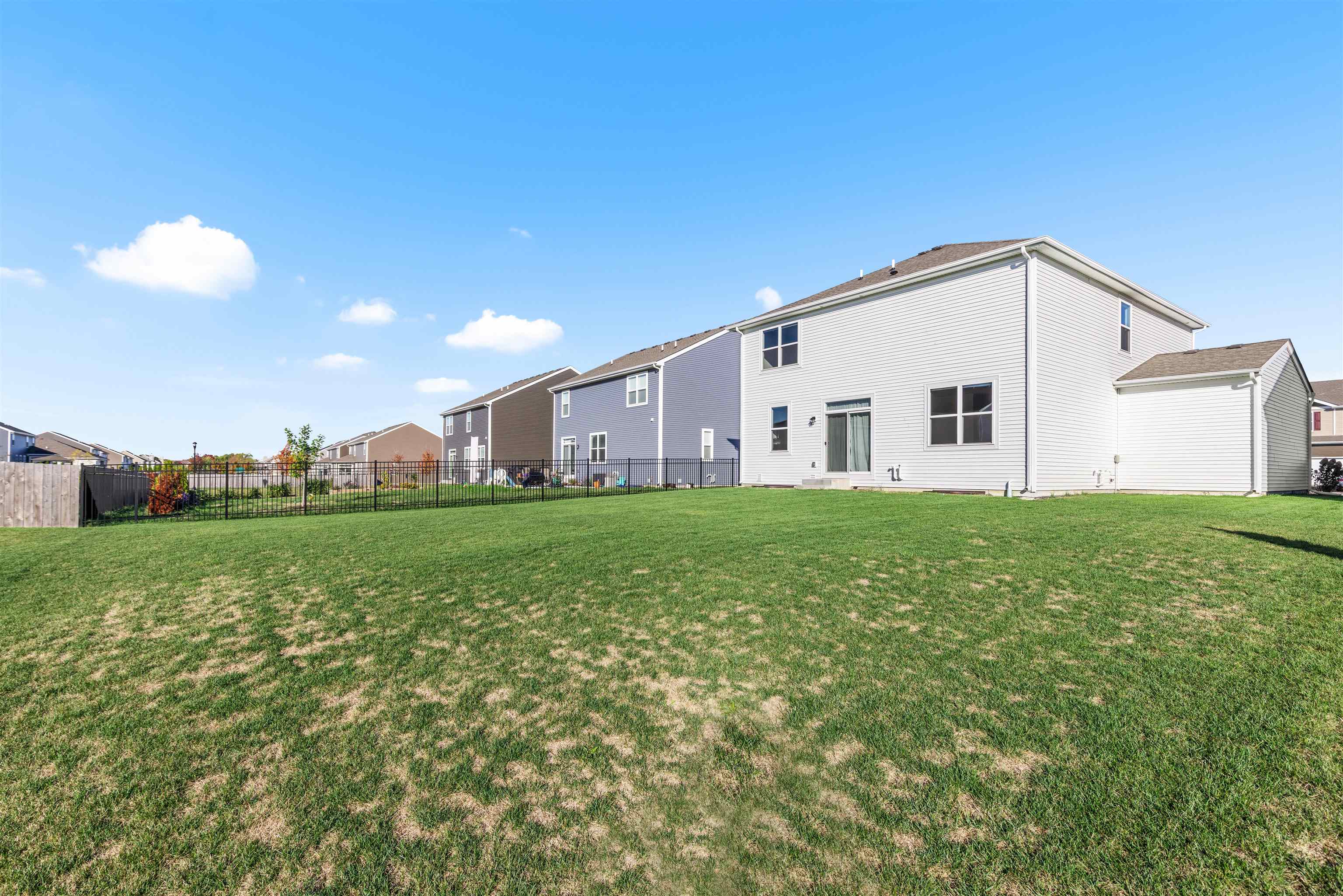 9981 Humbolt Avenue Huntley, IL 60142 - Photo 21 of 23 a view of a house with a yard and sitting area