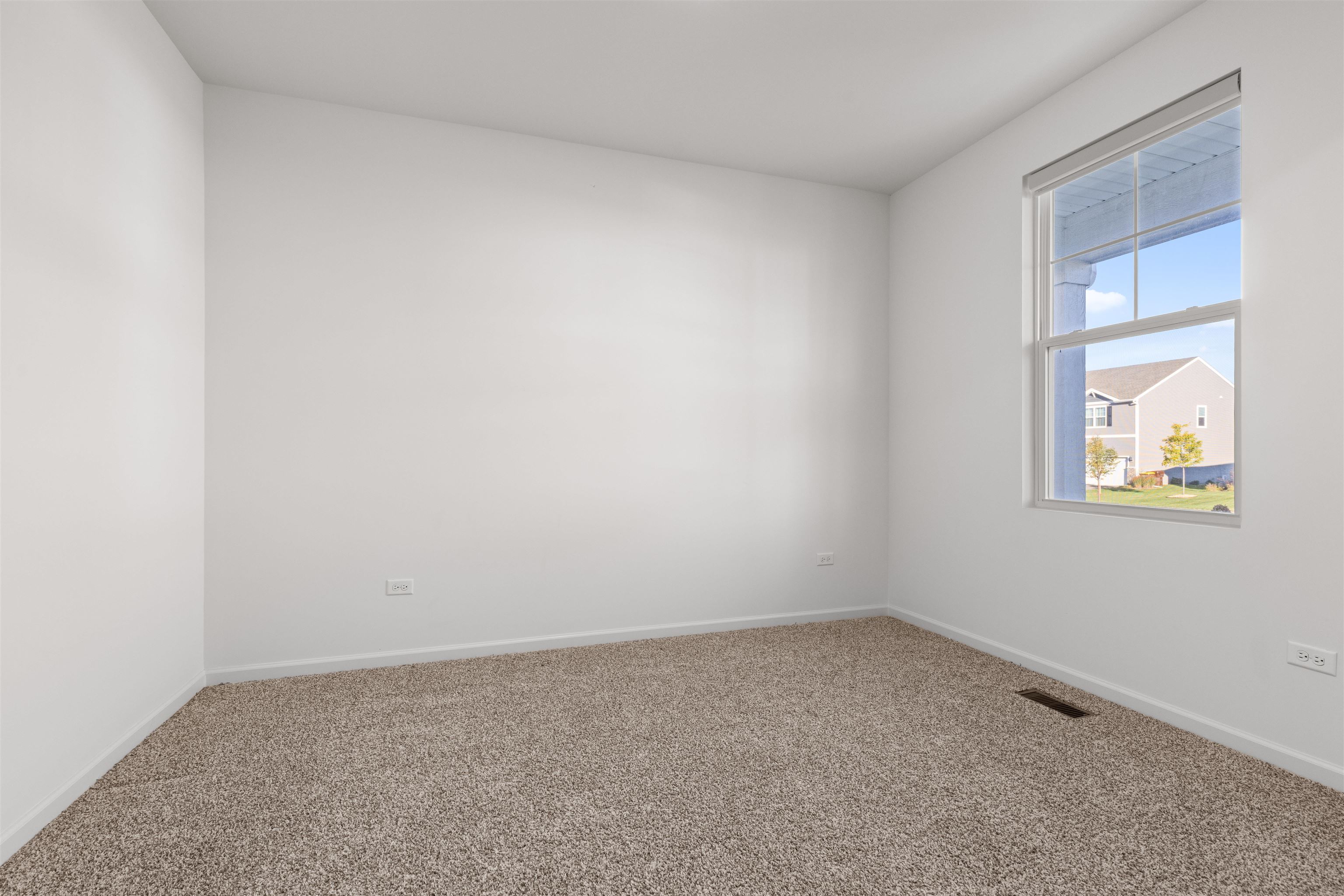 9981 Humbolt Avenue Huntley, IL 60142 - Photo 7 of 23 an empty room with a window