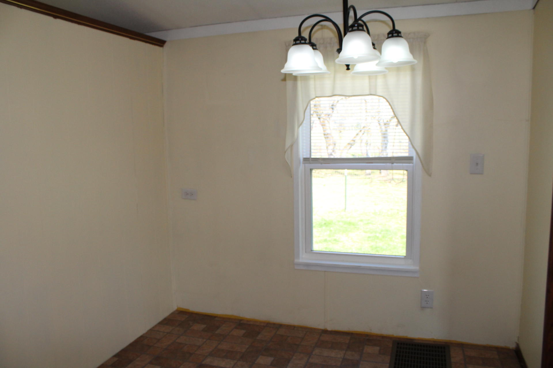 1740 Dewbar Road Elliston, VA 24087 - Photo 8 of 28 a room with a window