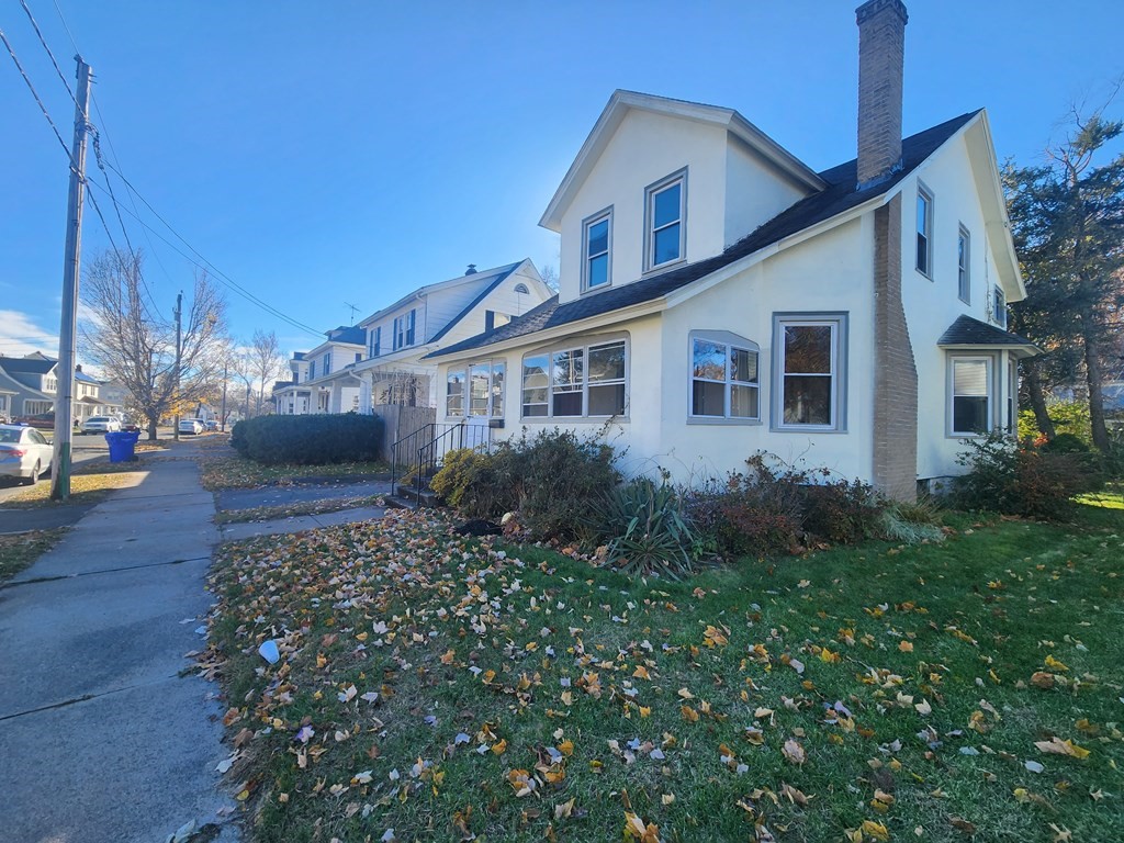 a house view with a garden space