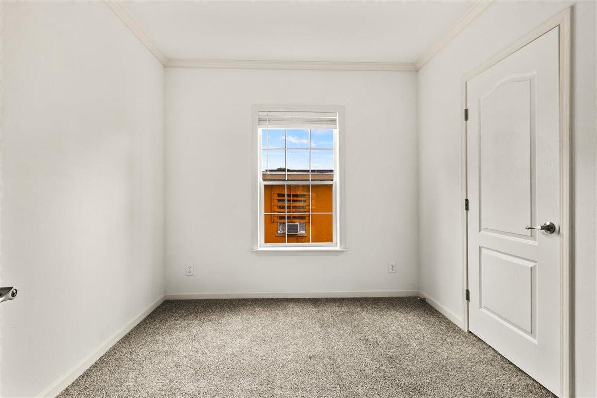 805 Ave B Fort Pierce, FL 34950 - Photo 24 of 29 an empty room with windows
