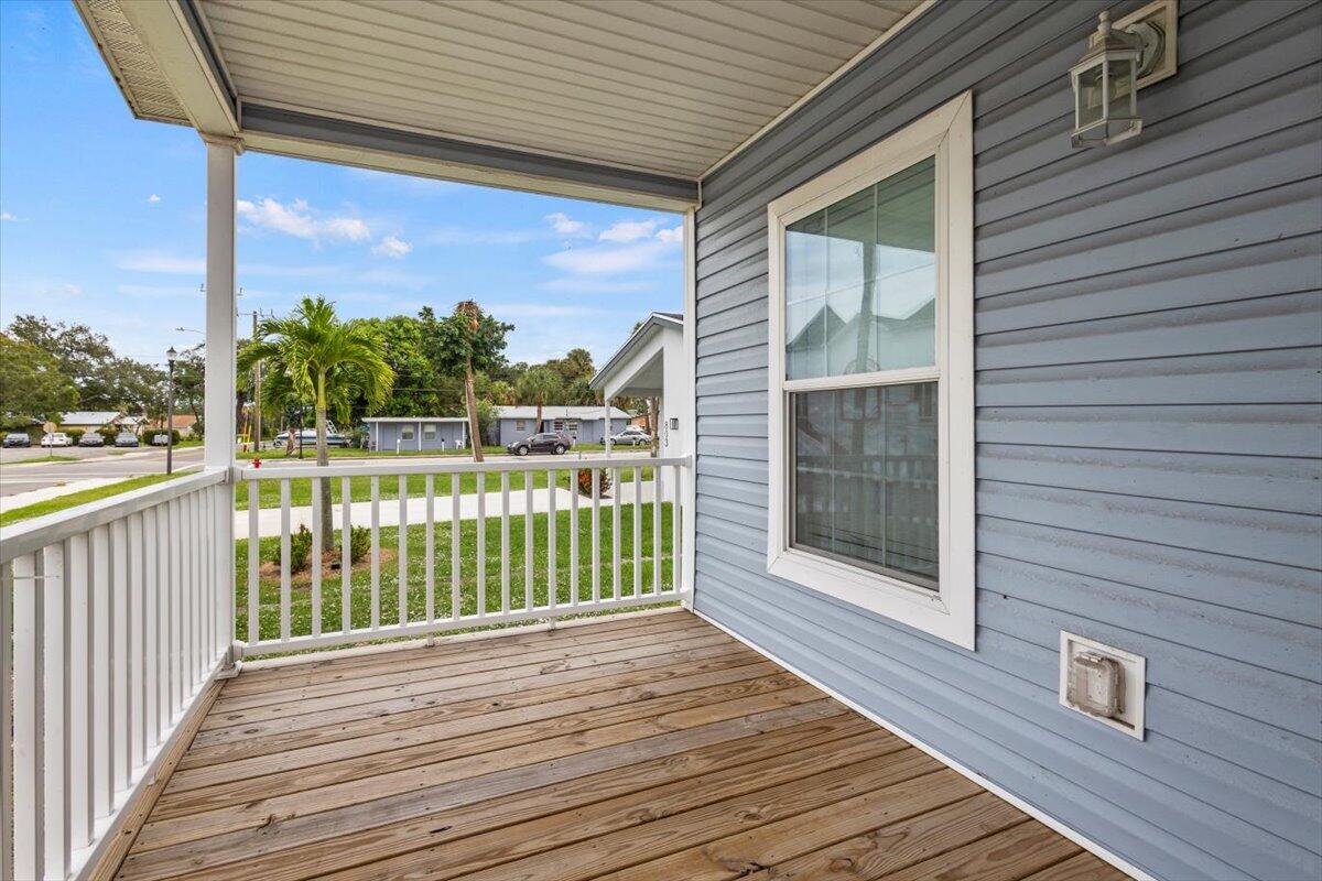 805 Ave B Fort Pierce, FL 34950 - Photo 26 of 29 a view of a balcony with wooden floor