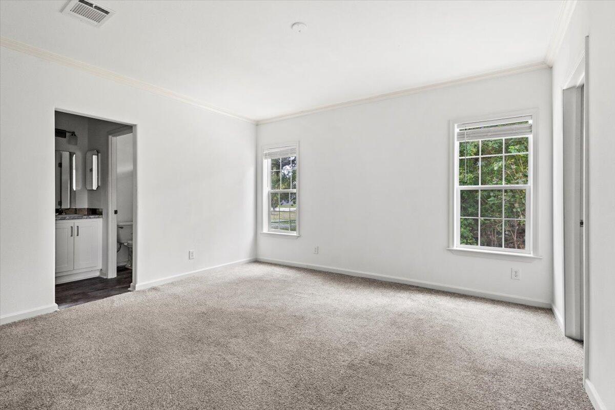 805 Ave B Fort Pierce, FL 34950 - Photo 10 of 29 an empty room with windows and cabinet