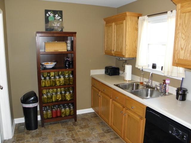 417 Blackey Bandy Road Bethpage, TN 37022 - Photo 8 of 20 Wider view of kitchen with entry on left to separate laundry room.