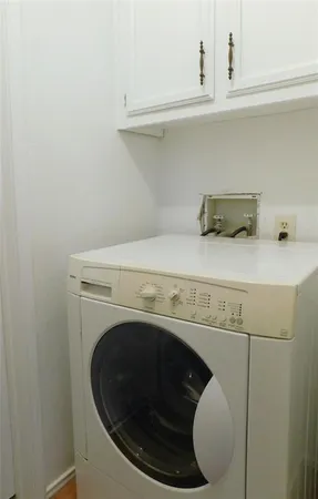 a view of a house with a street