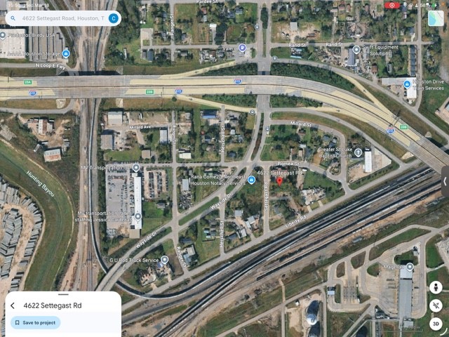 4622 Settegast Road Houston, TX 77028 - Photo 5 of 5 This aerial view shows a centrally located area in Houston, Texas, surrounded by major roads and railways. The neighborhood features a mix of homes, commercial buildings, and green spaces, offering convenient access to transportation and local amenities.