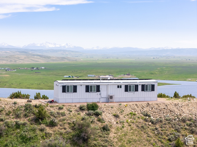 Mountain view featuring a large body of water