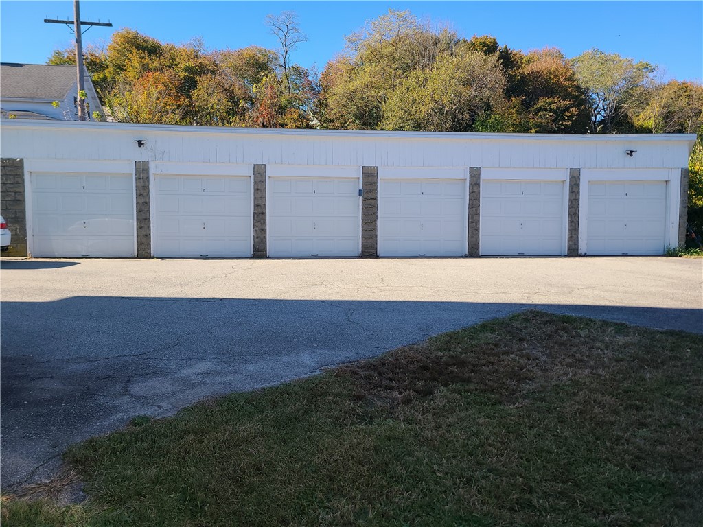85 Transit Street Woonsocket, RI 02895 - Photo 10 of 14 Individual 6 unit garages with newer garage doors