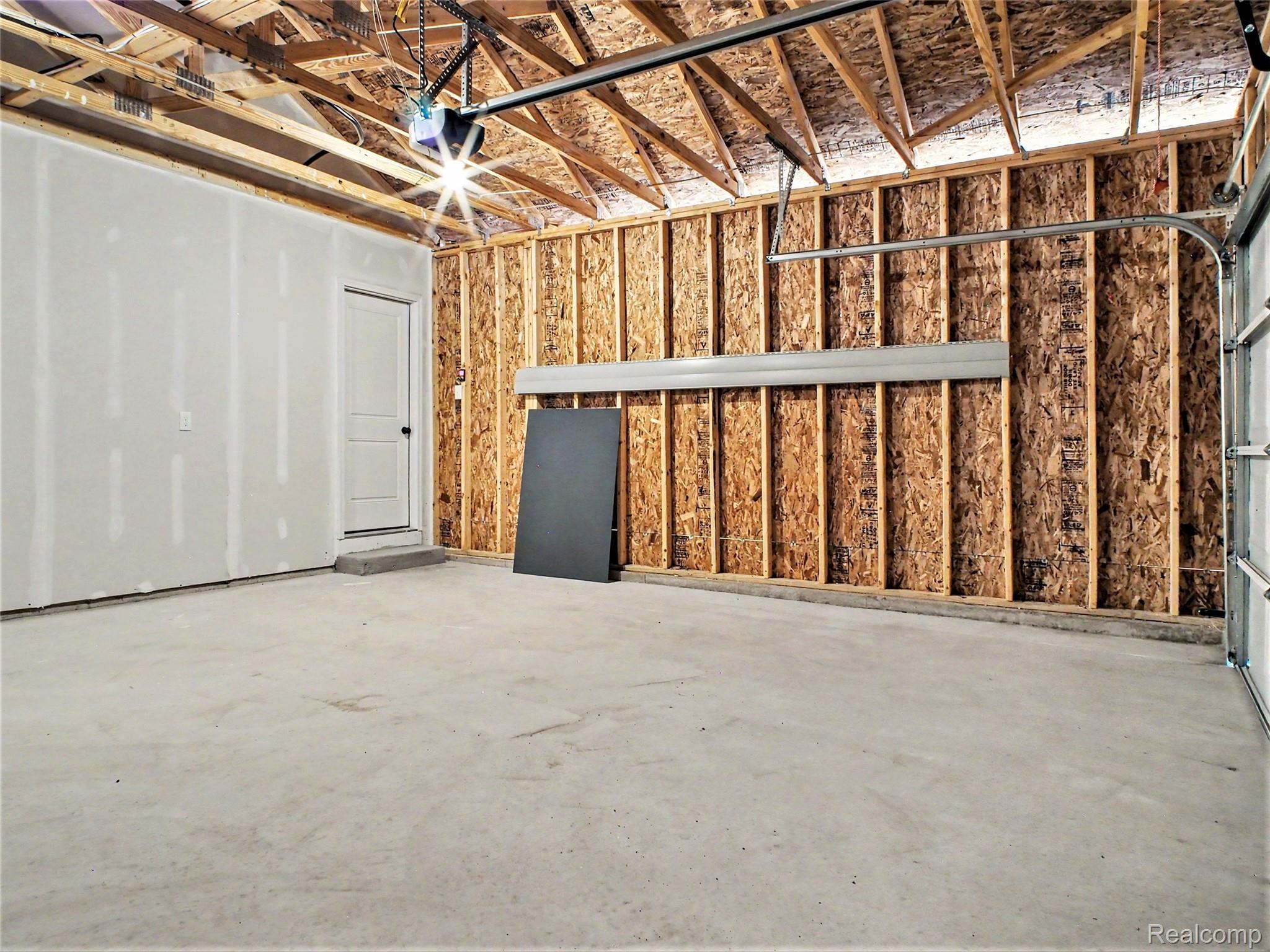 3166 Quail Ridge Court Clio, MI 48420 - Photo 17 of 23 2 stall attached garage