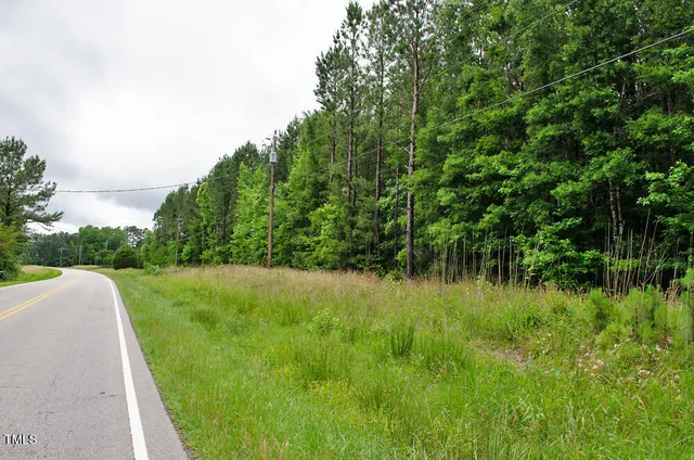 a view of a lake with a yard