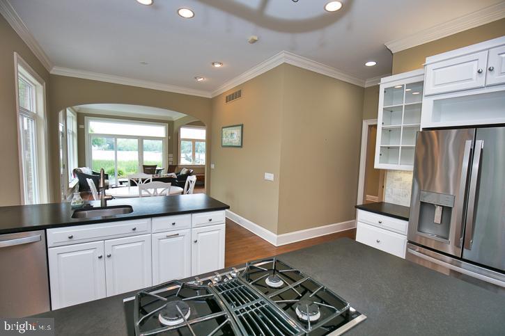 712 Riverside Pines Court Salisbury, MD 21801 - Photo 17 of 94 Kitchen is central and looks out to the water!