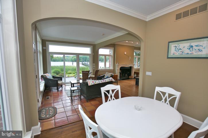 712 Riverside Pines Court Salisbury, MD 21801 - Photo 22 of 94 Eating area flows into the sunroom
