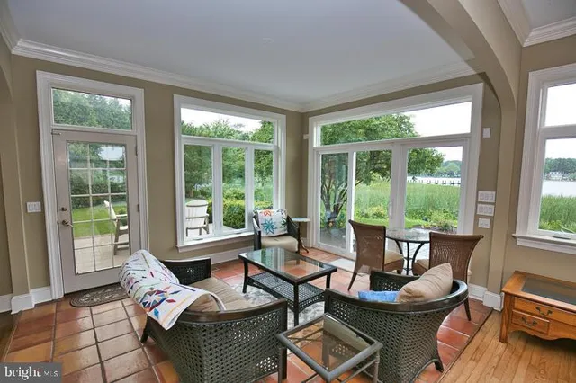 a patio with table and chairs