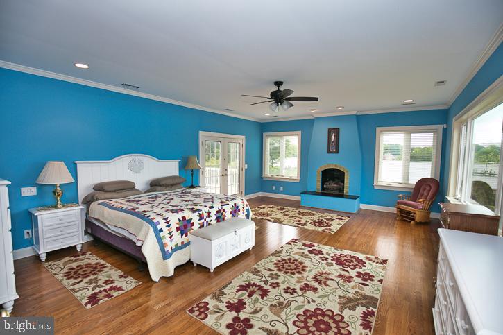 712 Riverside Pines Court Salisbury, MD 21801 - Photo 29 of 94 Master bedroom with gas fireplace