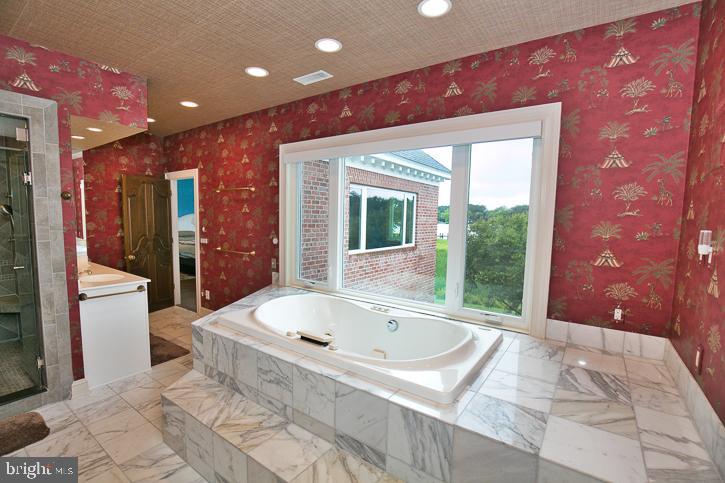 712 Riverside Pines Court Salisbury, MD 21801 - Photo 43 of 94 Retractable, electronic blinds for this window.