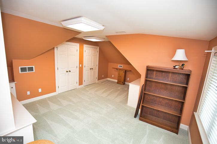 712 Riverside Pines Court Salisbury, MD 21801 - Photo 53 of 94 a view of walk in closet with empty racks