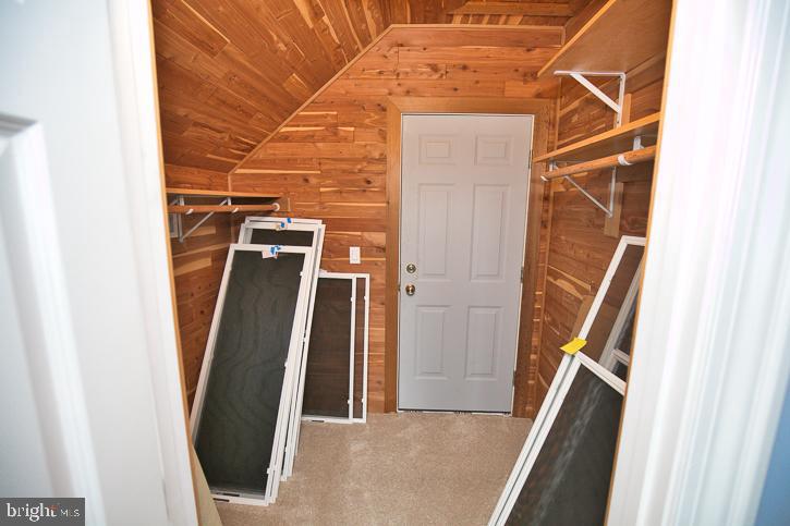 712 Riverside Pines Court Salisbury, MD 21801 - Photo 63 of 94 cedar closet storage leads to upstairs furnace