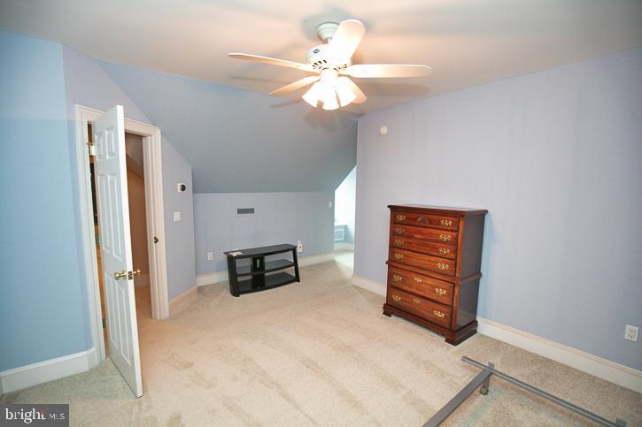 712 Riverside Pines Court Salisbury, MD 21801 - Photo 66 of 94 a view of kitchen with furniture and a chandelier fan