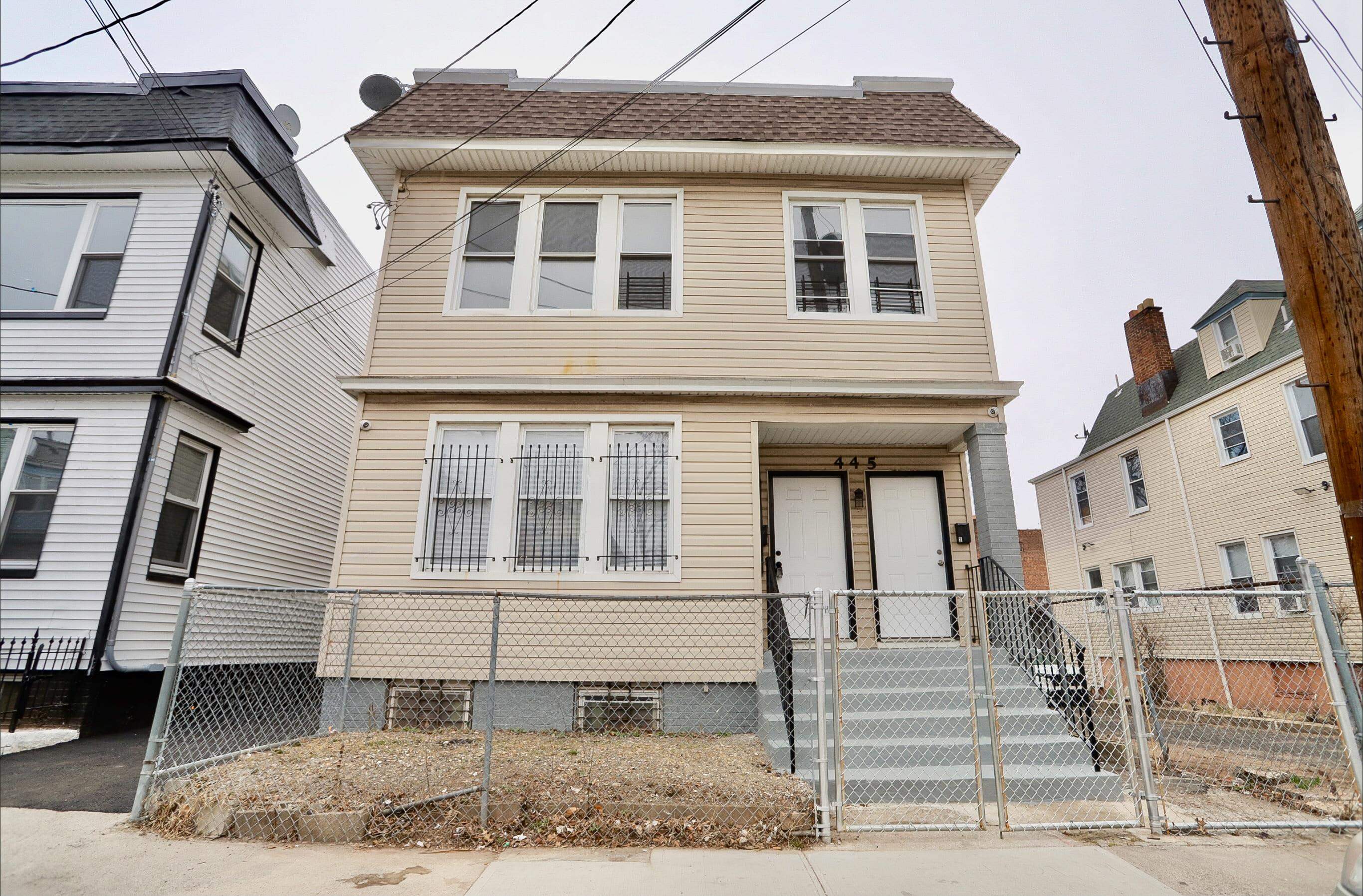 445 South 15th Street Newark, NJ 07103 - Photo 1 of 41 a front view of a house