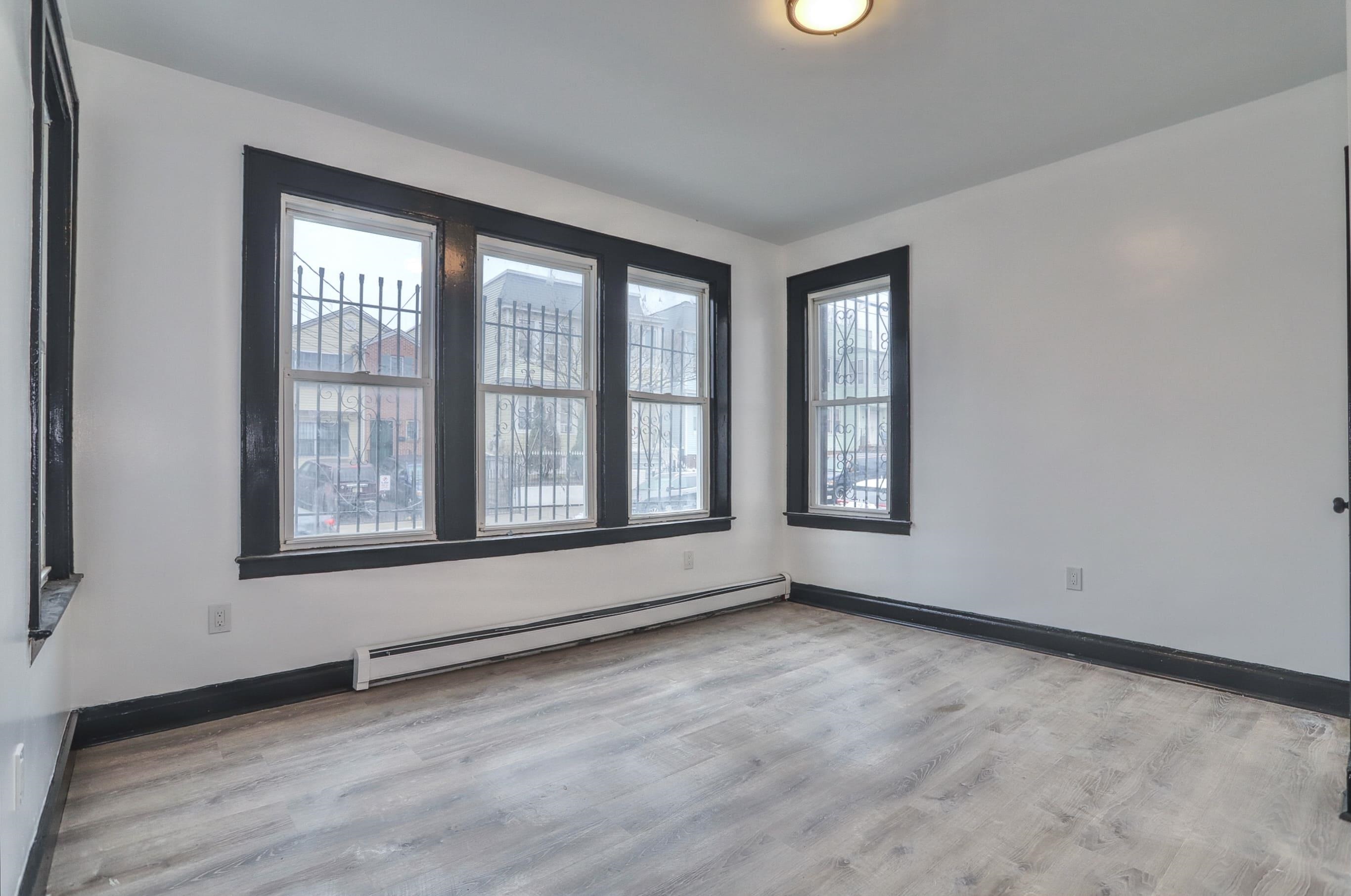445 South 15th Street Newark, NJ 07103 - Photo 13 of 41 a view of an empty room with a window