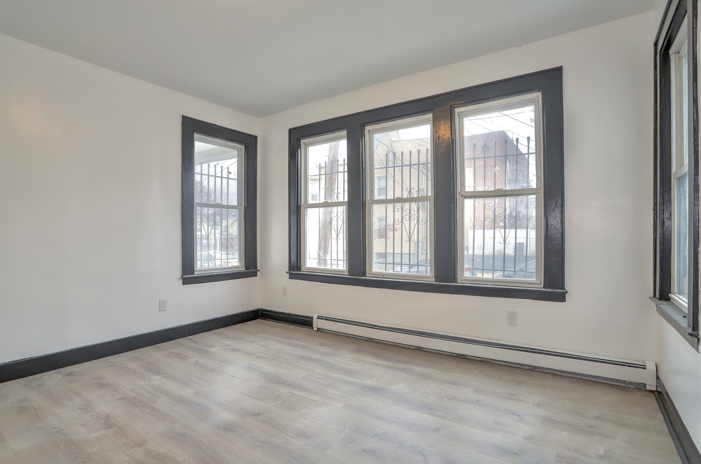 445 South 15th Street Newark, NJ 07103 - Photo 14 of 41 a view of an empty room with a window