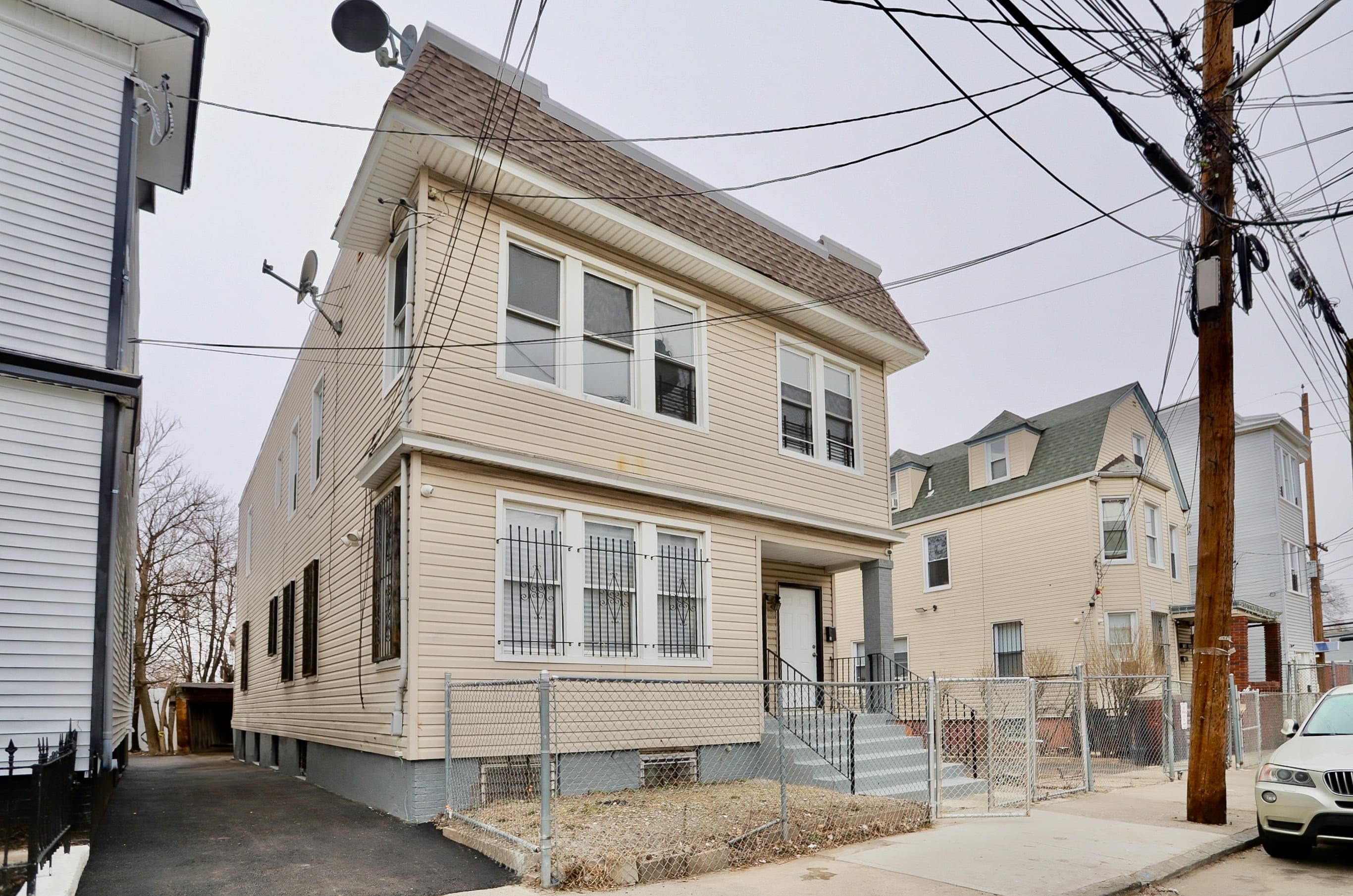 445 South 15th Street Newark, NJ 07103 - Photo 3 of 41 a view of a building with a street
