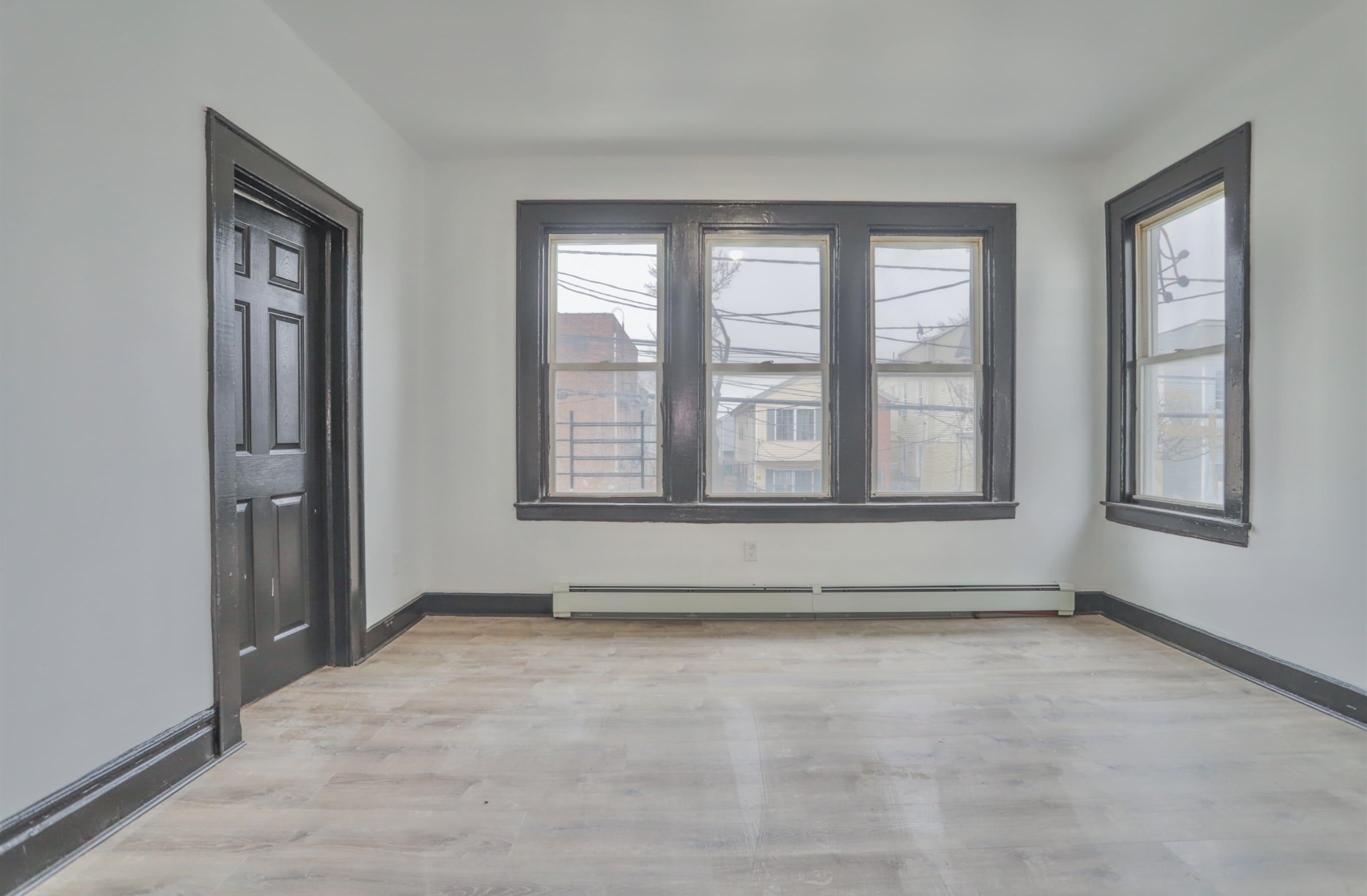 445 South 15th Street Newark, NJ 07103 - Photo 31 of 41 a view of an empty room with a window