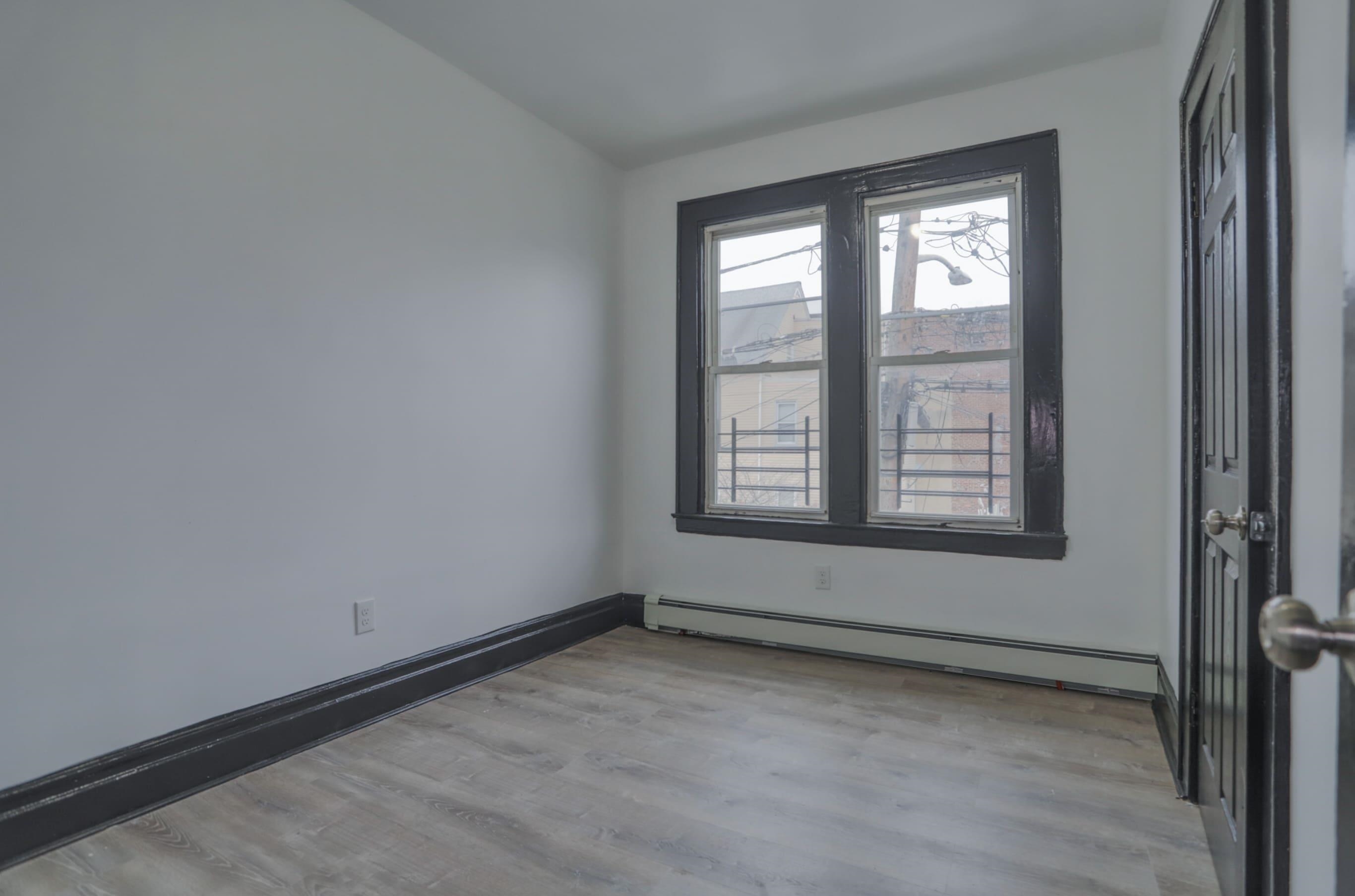 445 South 15th Street Newark, NJ 07103 - Photo 34 of 41 an empty room with a window