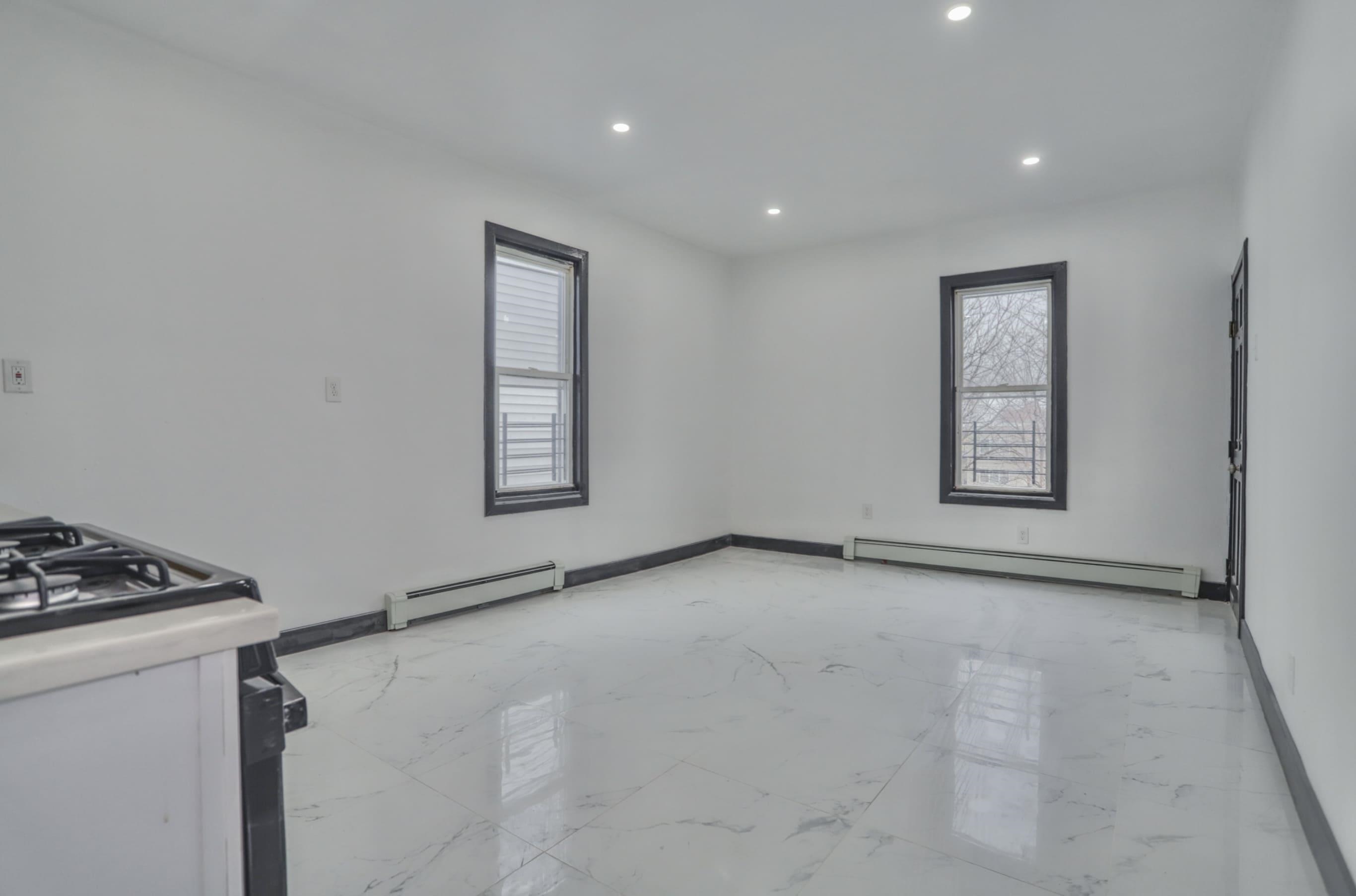445 South 15th Street Newark, NJ 07103 - Photo 38 of 41 a view of an empty room with a window