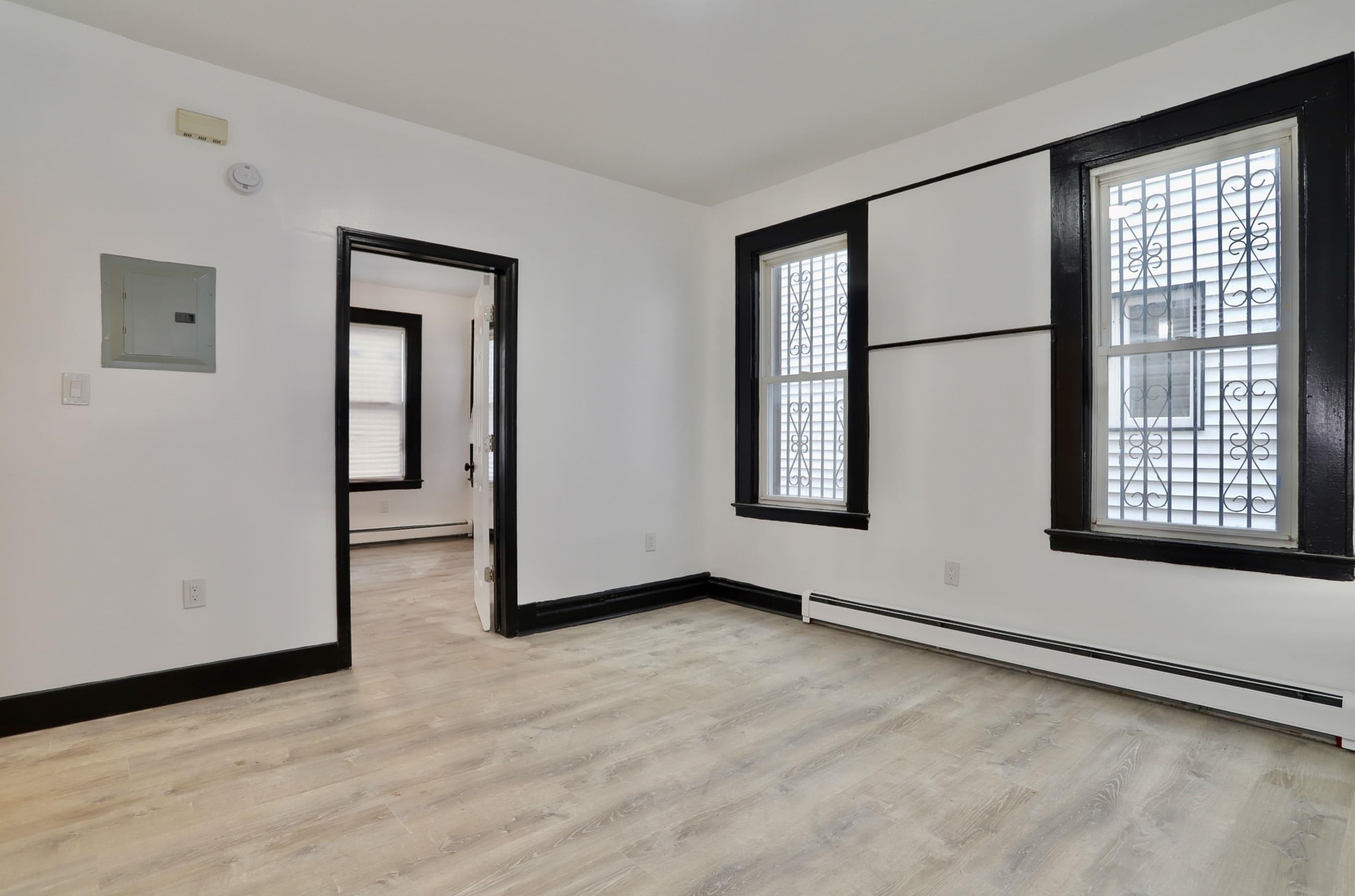 445 South 15th Street Newark, NJ 07103 - Photo 5 of 41 wooden floor in an empty room with a window