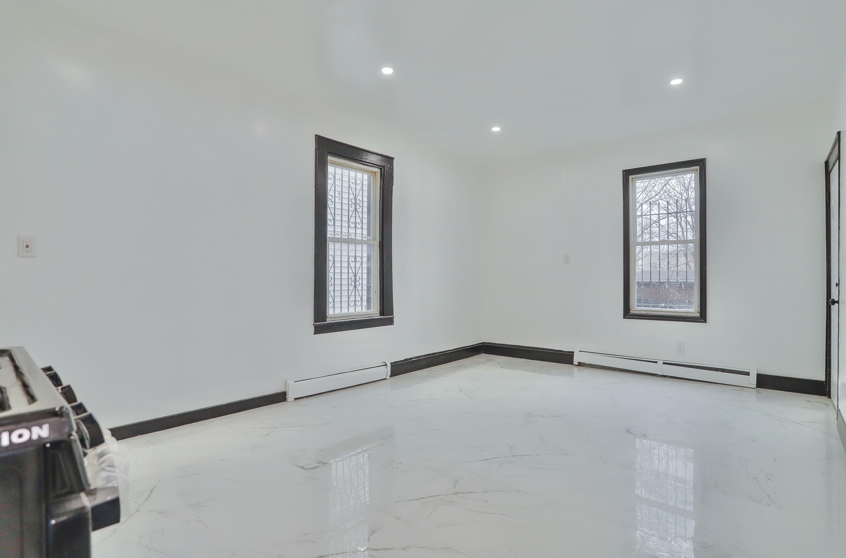 445 South 15th Street Newark, NJ 07103 - Photo 8 of 41 a view of an empty room with a window