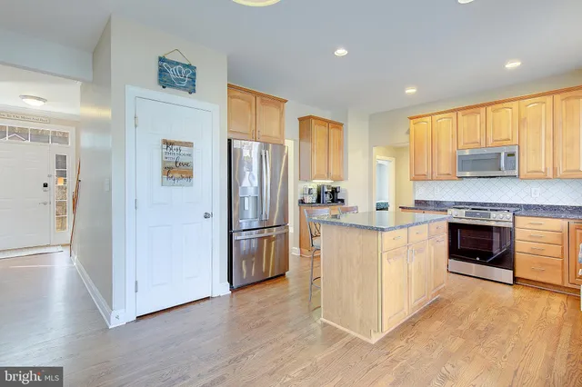 a living room with a table and a window