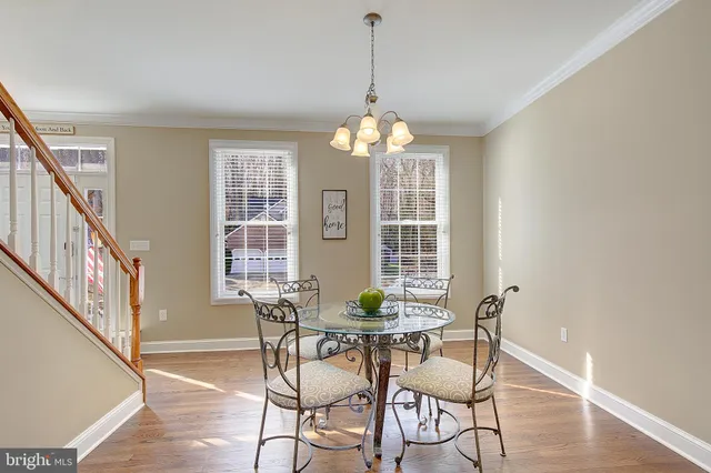 a kitchen with stainless steel appliances granite countertop a stove refrigerator sink and cabinets