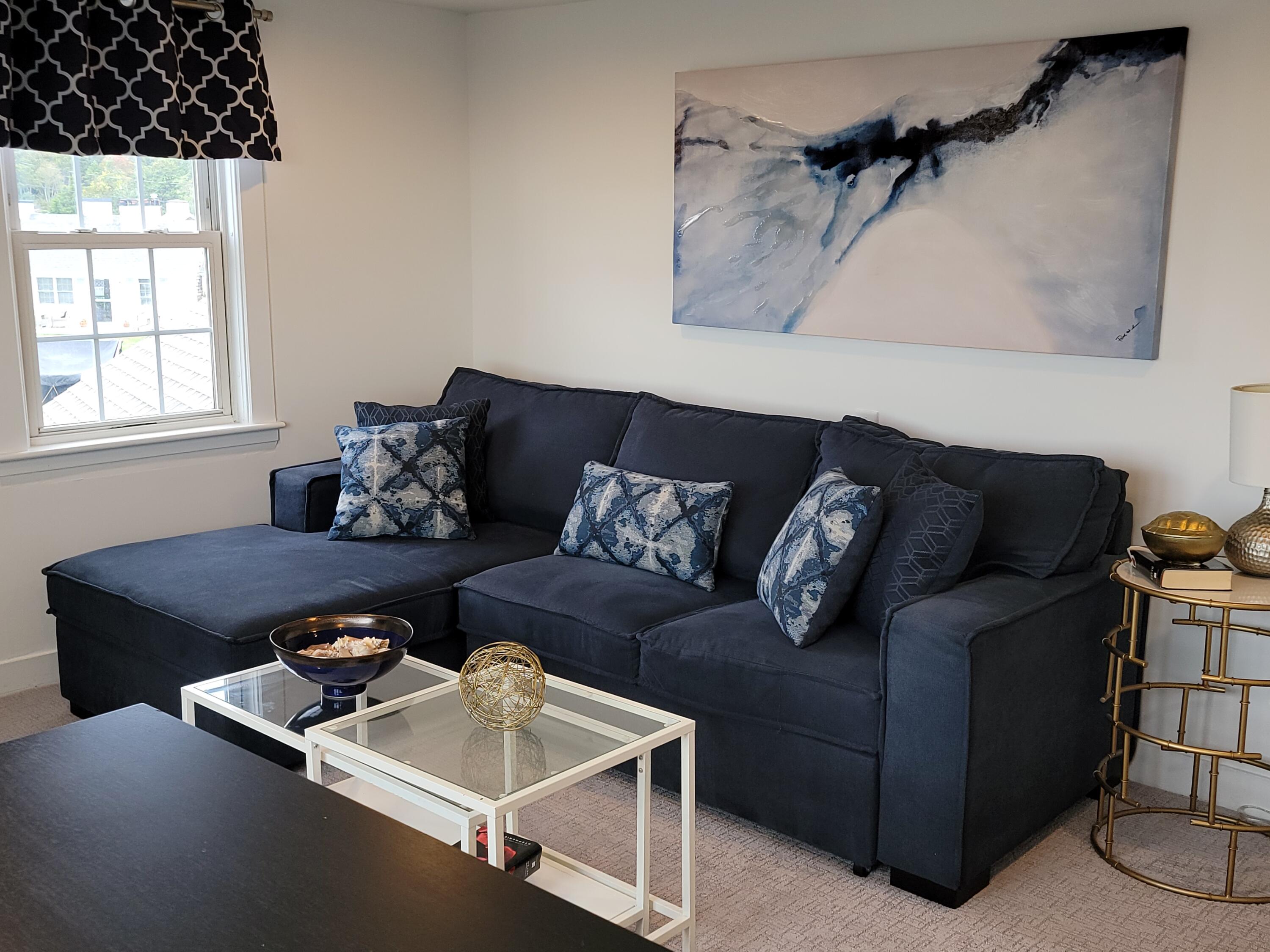 1060 Craigville Beach Road Centerville, MA 02632 - Photo 24 of 50 a living room with furniture and a window
