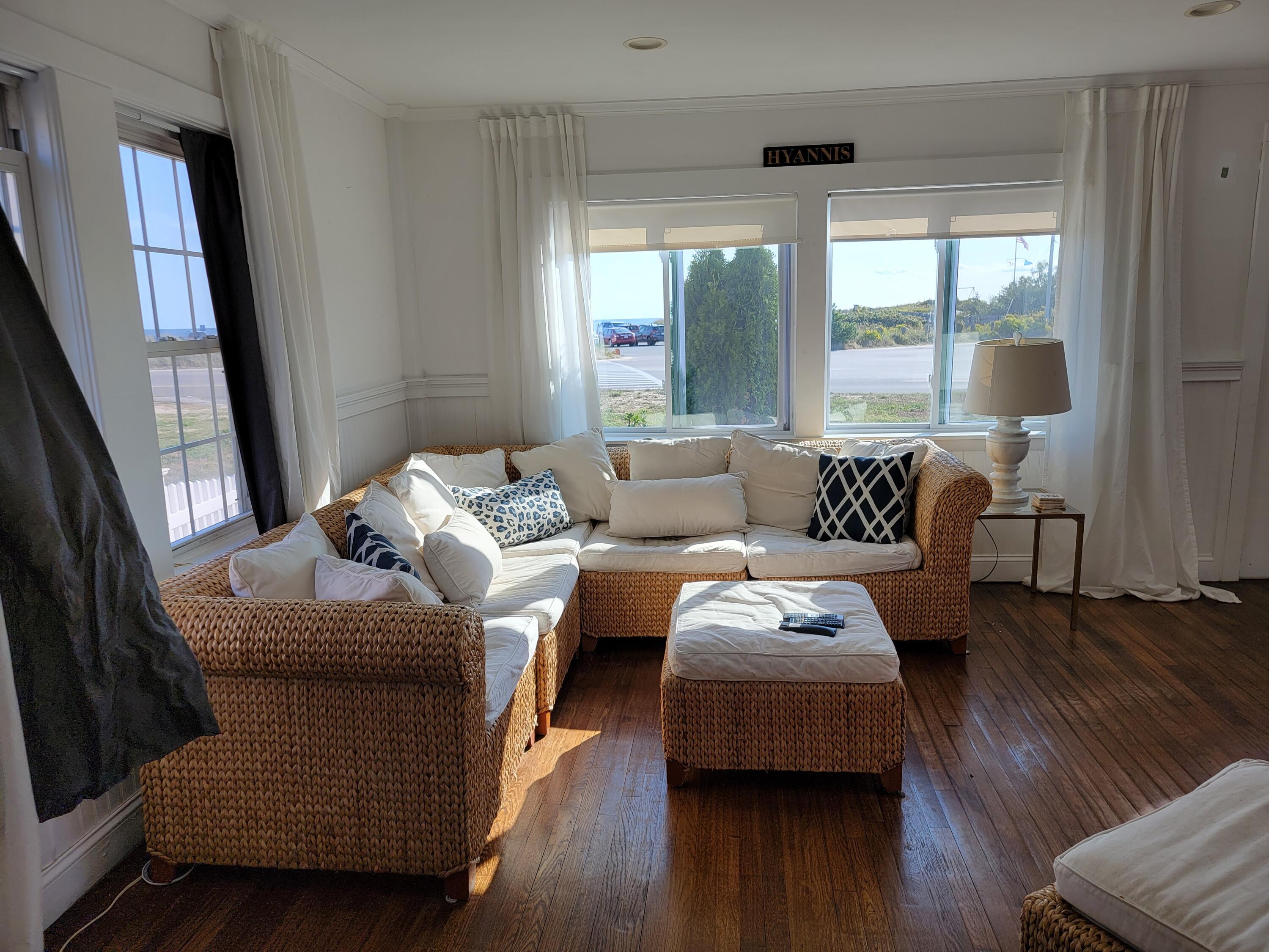 1060 Craigville Beach Road Centerville, MA 02632 - Photo 3 of 50 a living room with furniture and a window