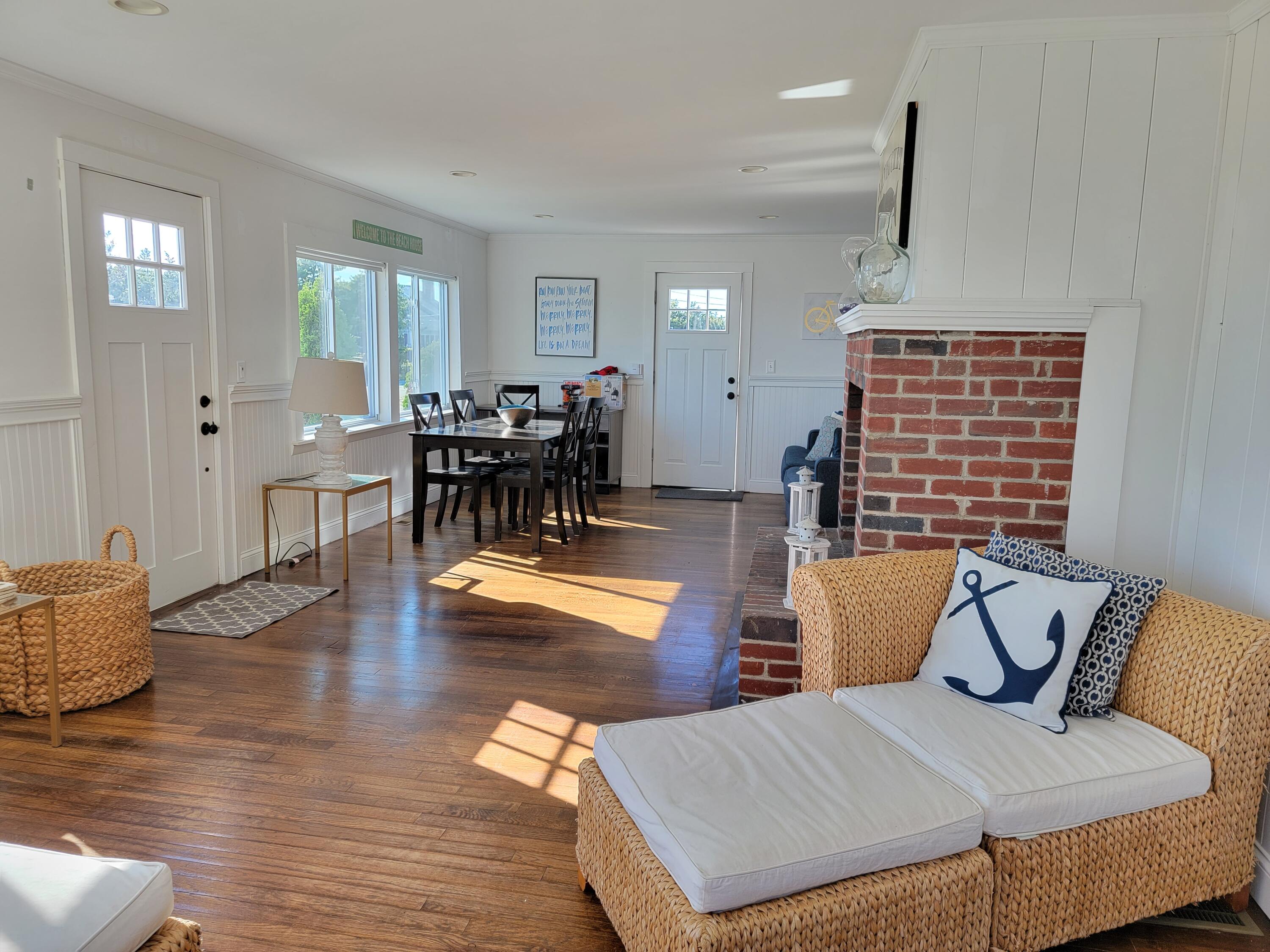 1060 Craigville Beach Road Centerville, MA 02632 - Photo 5 of 50 a living room with furniture and wooden floor