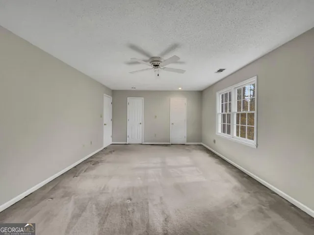 a bathroom with a sink vanity and a mirror
