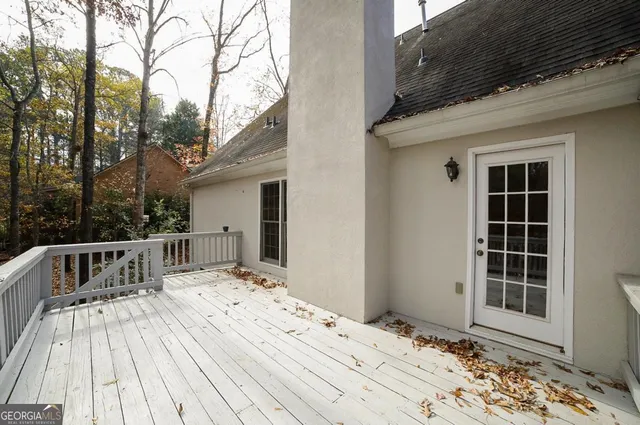 front view of a house with a large window