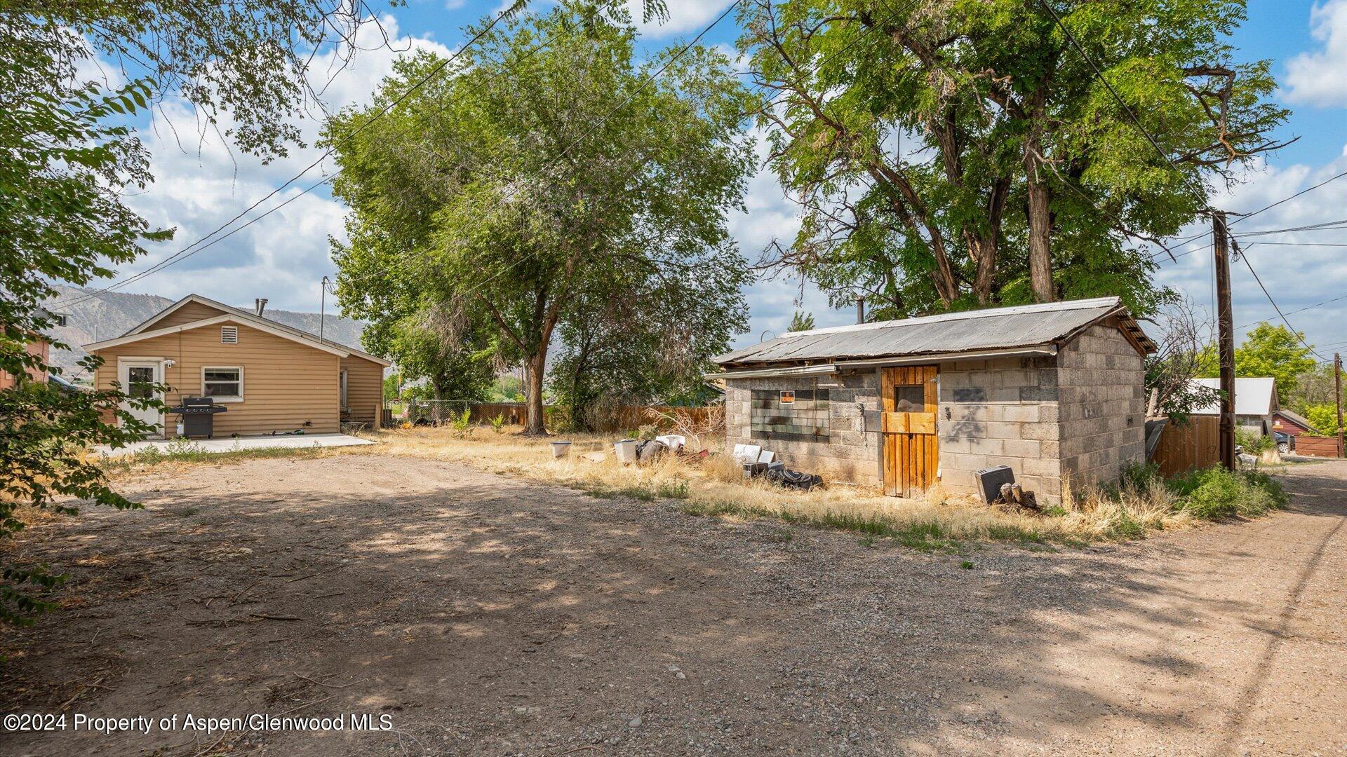 232 East 1st Street Rifle, CO 81650 - Photo 16 of 20 a view of a house with a outdoor space