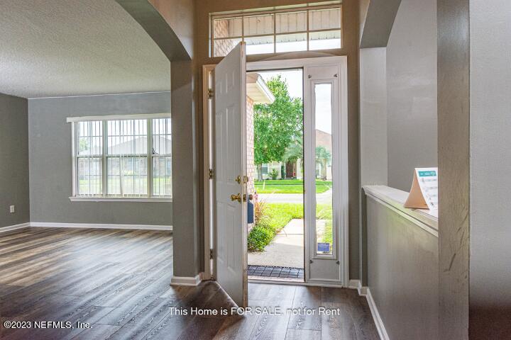 10329 Shelby Creek Road South Jacksonville, FL 32221 - Photo 3 of 41 a view of an entryway with wooden floor