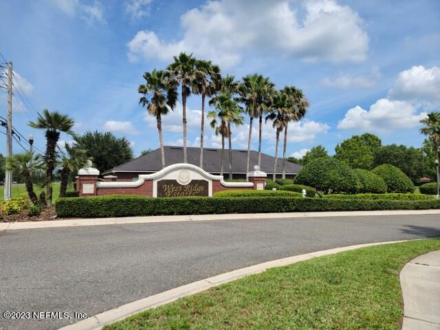 10329 Shelby Creek Road South Jacksonville, FL 32221 - Photo 41 of 41 a front view of a house with a yard and garage