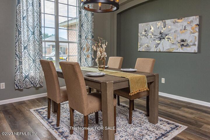 10329 Shelby Creek Road South Jacksonville, FL 32221 - Photo 8 of 41 a dining room with furniture and window