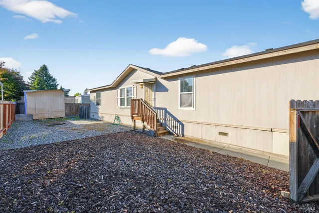 a view of a house with a street