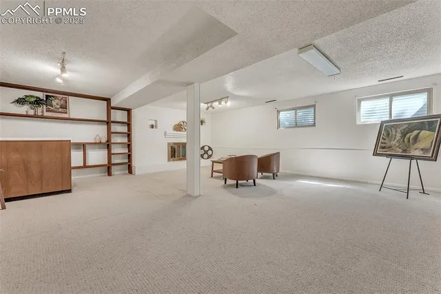 a view of a livingroom with furniture and a couch