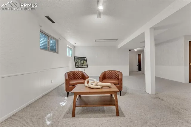 a view of a livingroom with furniture