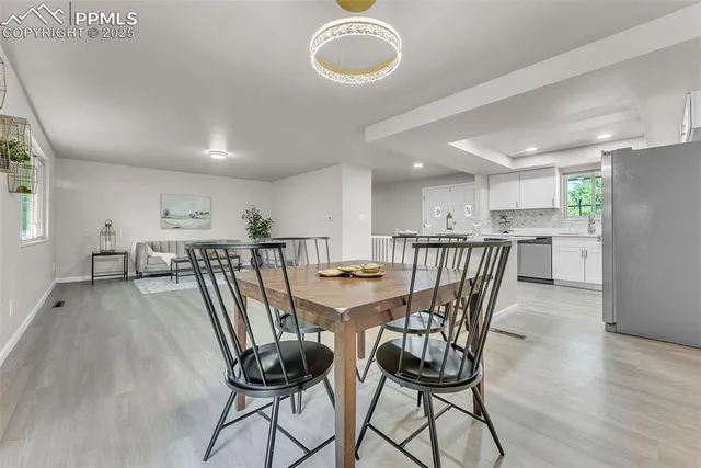 a view of a dining room with furniture