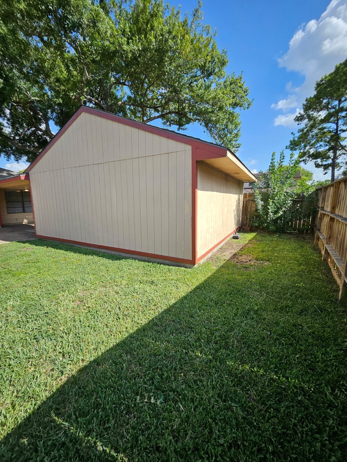 7206 Navidad Road Houston, TX 77083 - Photo 17 of 48 a backyard of a house with lots of green space